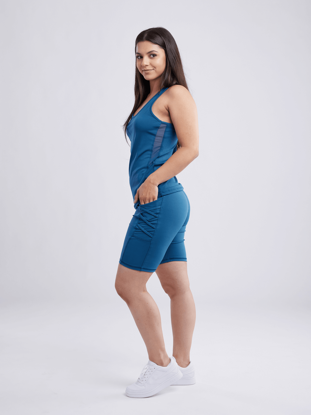 High-Waisted Workout Shorts with Pockets with Criss Cross Design