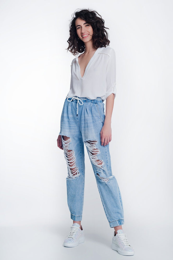 Heavily Ripped Boyfriend Jeans in Light Denim