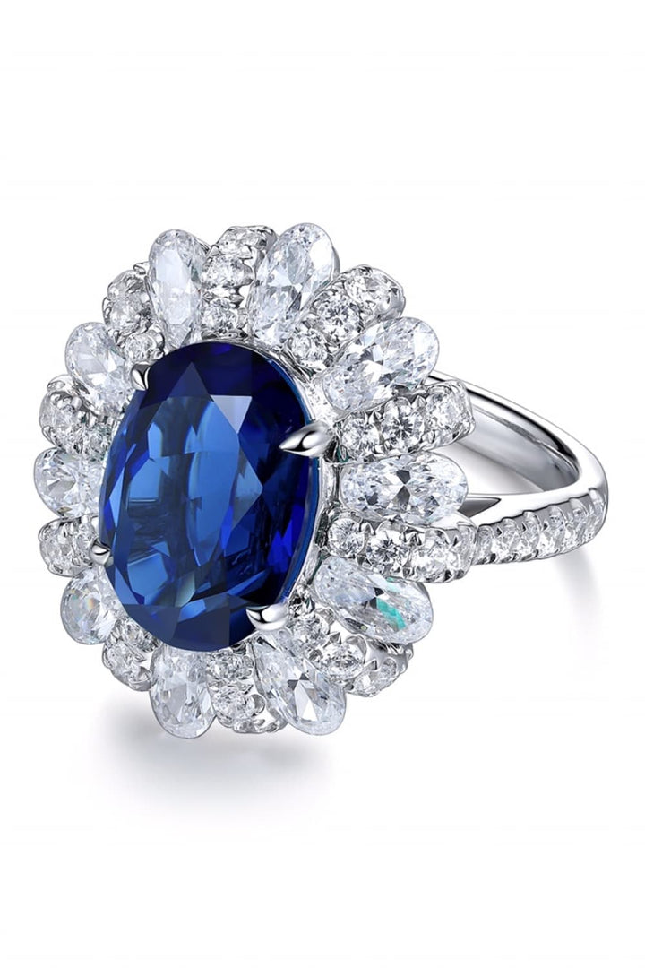 Oval Sapphire in Flower Shape CZ Ring