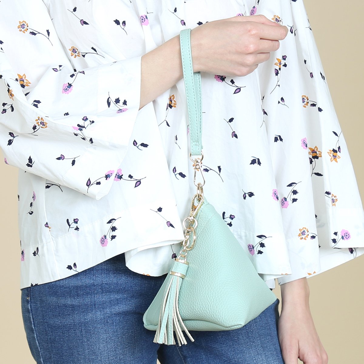 Pyramid Shape Tassel Wristlet Leather Bag